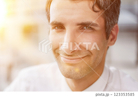 Confident young businessman posing in the office Confident young businessman posing in the office 123353585