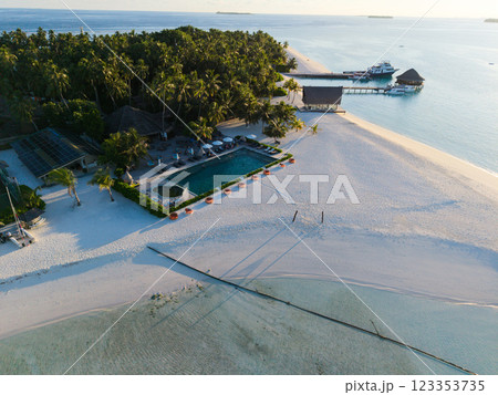 Aerial views of Velavaru Island at sunset in Maldives 123353735