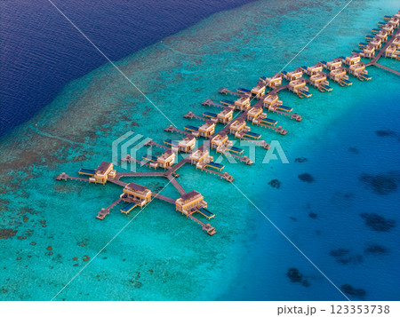Aerial views of Velavaru Island at sunset in Maldives 123353738
