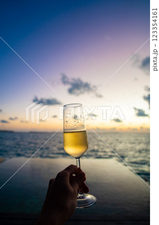 Sunset views from overwater pool villa in Maldives Sunset views from overwater pool villa in Maldives 123354161