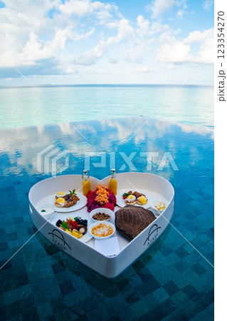Floating breakfast in a heart shape in the pool in Maldives 123354270