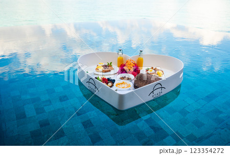 Floating breakfast in a heart shape in the pool in Maldives 123354272
