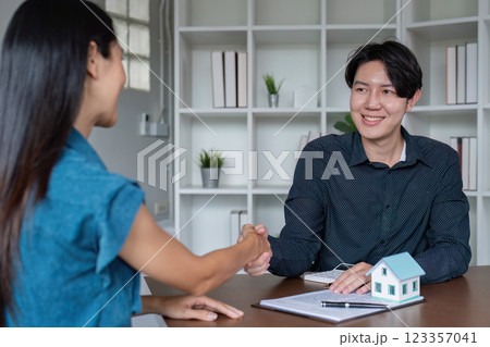 Professional Property Agreement Finalization Process in Real Estate Setting 123357041
