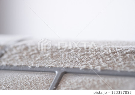 クーラーのフィルターに溜まった埃のイメージ　(写真素材) 123357853
