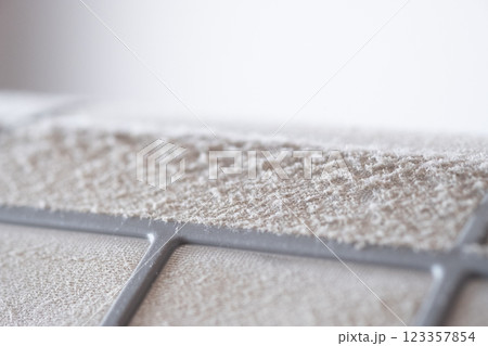 クーラーのフィルターに溜まった埃のイメージ　(写真素材) 123357854