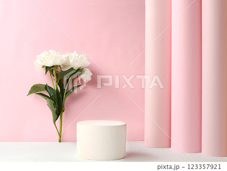 Stage for product display and business concept.Minimal modern aesthetic.Beautiful flower arrangement,Empty podium for product and fresh peony flowers,elegant beauty concept,selective focus 123357921