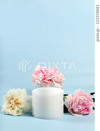 Abstract floral arrangement, empty podium for product and fresh peony flowers,Stage for demonstrating product and business concept. Minimal modern aesthetics.  elegant beauty concept, selective focus 123358081