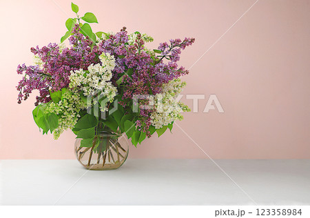 Abstract flower arrangement, home interior with beautiful spring lilac branches in a vase, banner, still life with space for text, floral holiday card, selective focus 123358984