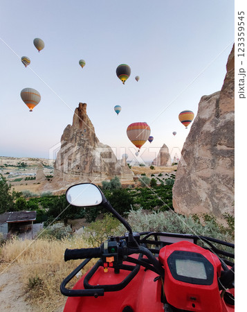 ATV riding in the mountainous terrain of Cappadocia ATV riding in the mountainous terrain of Cappadocia 123359545