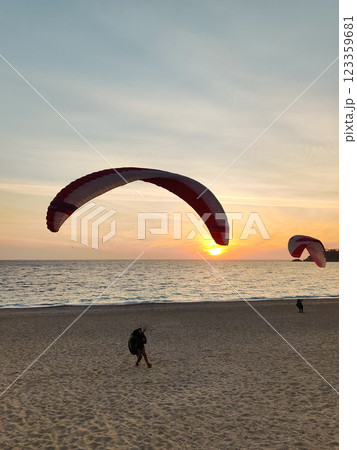 beautiful landscape with a view of the sea flying on a paraglider beautiful landscape with a view of the sea flying on a paraglider 123359681