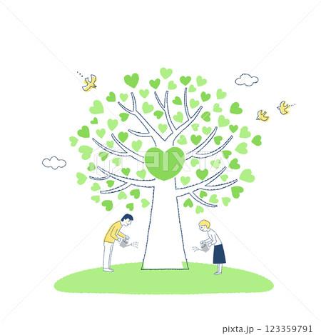 大きなハートの木に水やりをする男女 123359791