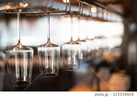 empty clean glass glasses for alcoholic drinks in a restaurant on a bar counter empty clean glass glasses for alcoholic drinks in a restaurant on a bar counter 123359929