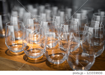 empty clean glass glasses for alcoholic drinks in a restaurant on a bar counter empty clean glass glasses for alcoholic drinks in a restaurant on a bar counter 123359930