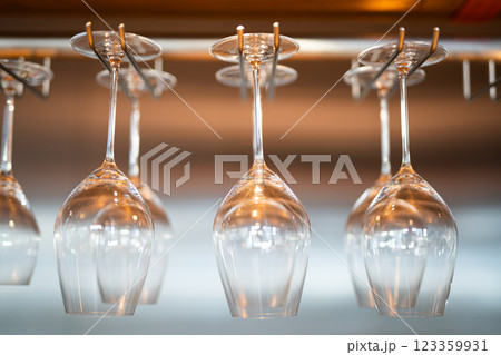 empty clean glass glasses for alcoholic drinks in a restaurant on a bar counter empty clean glass glasses for alcoholic drinks in a restaurant on a bar counter 123359931