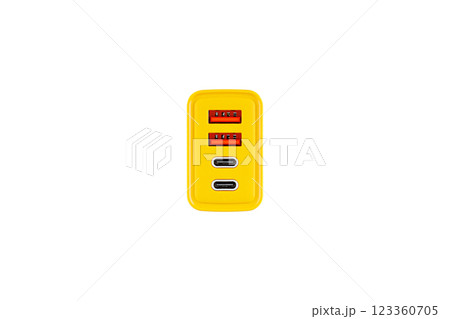 adapter for charger with USB and Type C connector, yellow, on isolated or white background adapter for charger with USB and Type C connector, yellow, on isolated or white background 123360705