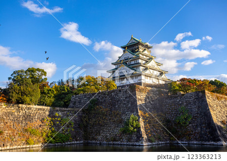 Landscape view of Osaka Castle main keep during autumn season at Osaka ,Japan Landscape view of Osaka Castle main keep during autumn season at Osaka ,Japan 123363213