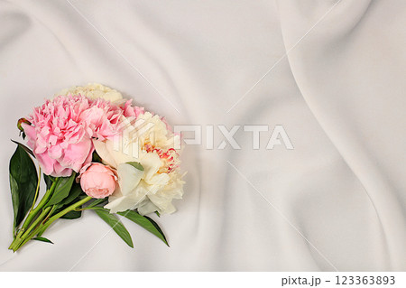 Abstract floral arrangement, flat lay, bouquet of beautiful peonies on an elegant background, spring and summer banner. Creative modern bouquet. Mother's Day card, happy birthday, wedding, holiday Abstract floral arrangement, flat lay, bouquet of beautiful peonies on an elegant background, spring and summer banner. Creative modern bouquet. Mother's Day card, happy birthday, wedding, holiday 123363893