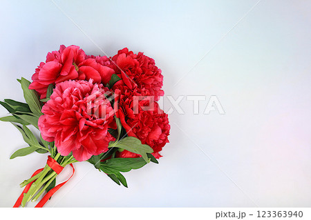 Abstract floral composition, flat lay, beautiful burgundy peonies on an elegant background, spring and summer banner. Creative modern bouquet. Mother's Day card, happy birthday, wedding, pattern, 123363940