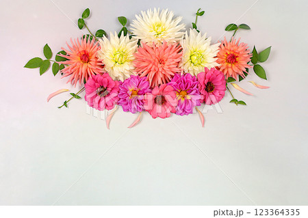 Abstract floral arrangement. Beautiful autumn banner with dahlias, gerberas and asters on light background, holiday card, seasonal still life Hello, autumn , template of seasonal flowers, . Abstract floral arrangement. Beautiful autumn banner with dahlias, gerberas and asters on light background, holiday card, seasonal still life Hello, autumn , template of seasonal flowers, . 123364335