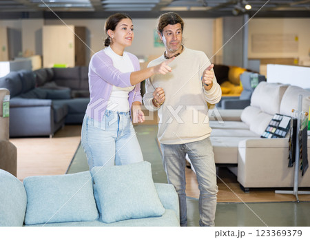 Couple choose new furniture in a store Couple choose new furniture in a store 123369379