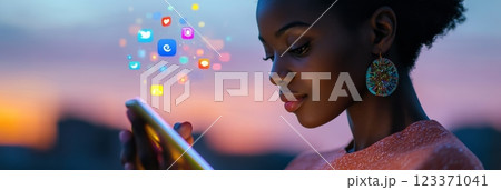 Young woman is using a smartphone with colorful social media icons floating above at sunset, representing the concept of social media marketing and mobile app engagement Young woman is using a smartphone with colorful social media icons floating above at sunset, representing the concept of social media marketing and mobile app engagement 123371041
