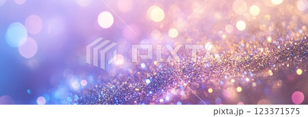 Expansive view of Christmas gifts laid out on a shimmering blue festive background, invoking holiday cheer. 123371575