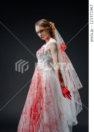Bride in bloodied lingerie with katana evokes dark fantasy and horror elements Bride in bloodied lingerie with katana evokes dark fantasy and horror elements 123371967