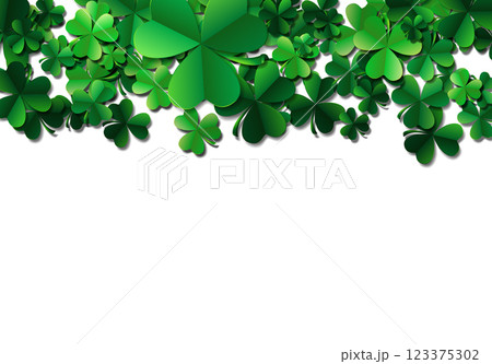 Saint Patricks day background with sprayed green clover leaves o 123375302