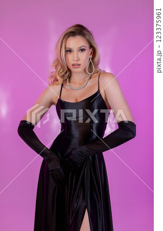 Discover the allure of elegant black fashion accessorized with glamorous and stunning details Discover the allure of elegant black fashion accessorized with glamorous and stunning details 123375961