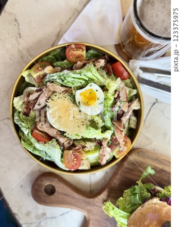 Salad with lettuce, tomato, chicken and egg Salad with lettuce, tomato, chicken and egg 123375975