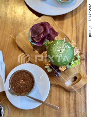 Vegan green burger with beans Vegan green burger with beans 123375992