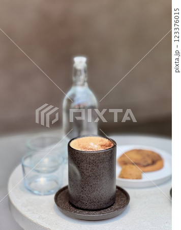 A cup of coffee cappuccino or latte on the table 123376015