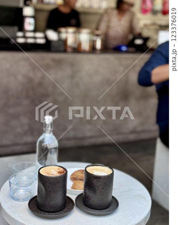 A cup of coffee cappuccino or latte on the table 123376019