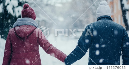 Couple Walking Hand in Hand During Snowfall in...のイラスト素材 [123376083 ...