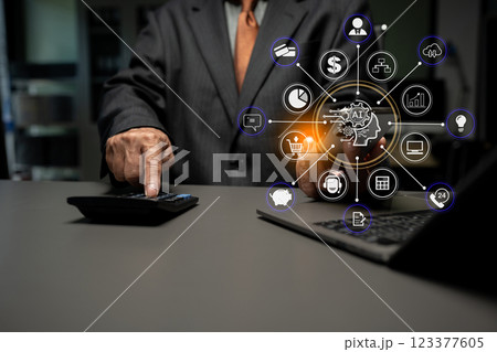Business and financial concepts about office work. Analysts discuss business with a calculator as a tool. Business and financial concepts about office work. Analysts discuss business with a calculator as a tool. 123377605