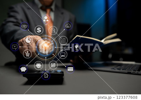 Business and financial concepts about office work. Analysts discuss business with a calculator as a tool. 123377608