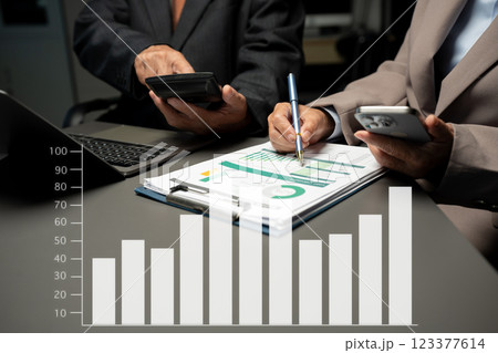 Business team meeting present.professional investor working with new startup project. Finance managers task. Digital tablet laptop computer design smart phone. Business team meeting present.professional investor working with new startup project. Finance managers task. Digital tablet laptop computer design smart phone. 123377614