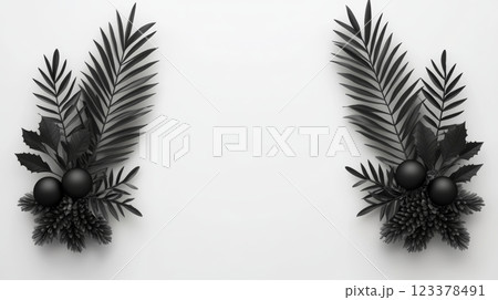 Black foliage arrangement with decor on white background 123378491