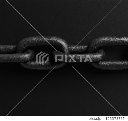 Strong black chain links on a dark background creating a bold effect 123378735