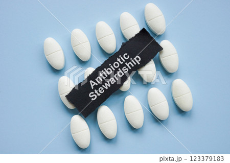 Pills with the words antibiotic stewardship. Represents responsible medication use. 123379183