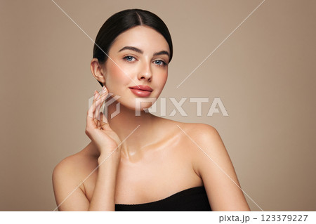 Portrait beautiful young woman with clean fresh skin 123379227