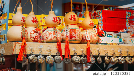 Beijing, China. Souvenir Vessel. Souvenirs From Bottle Gourd Or Calabash. Chinese Souvenir Shop. Opo Squash, Calabash Or Hulu - Traditional Chinese Bottle Gourd Is Ancient Symbol For Health. Symbol Of Beijing, China. Souvenir Vessel. Souvenirs From Bottle Gourd Or Calabash. Chinese Souvenir Shop. Opo Squash, Calabash Or Hulu - Traditional Chinese Bottle Gourd Is Ancient Symbol For Health. Symbol Of 123380385