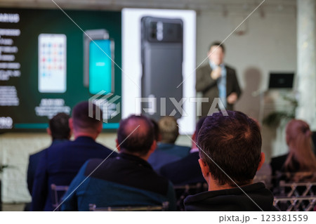 Audience attending technology presentation with focus on digital innovation discussion 123381559