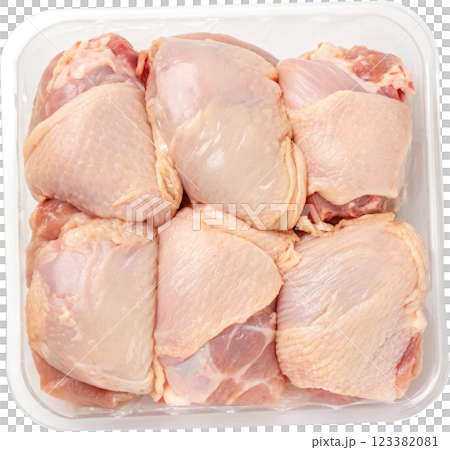 Uncooked Chicken Thighs in Plastic Tray on Plain White Background for Food Photography Uncooked Chicken Thighs in Plastic Tray on Plain White Background for Food Photography 123382081
