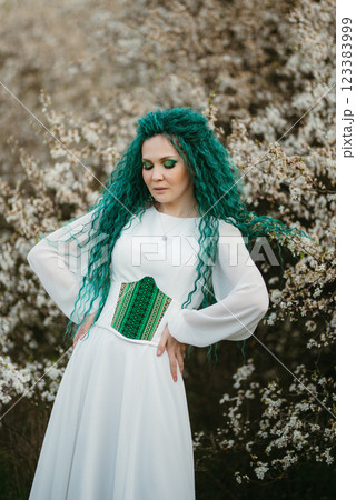 young girl bride with green hair in a national dress 123383999