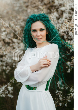 young girl bride with green hair in a national dress young girl bride with green hair in a national dress 123384007
