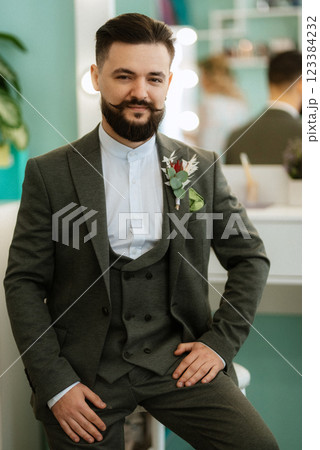 portrait of smiling groom with beard in gray color suit portrait of smiling groom with beard in gray color suit 123384232