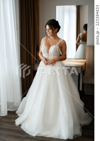 bride in a white dress at the training camp 123384833