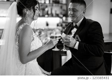bride and groom inside a cocktail bar 123385431