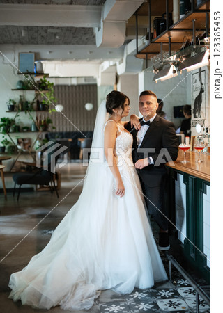 bride and groom inside a cocktail bar bride and groom inside a cocktail bar 123385453